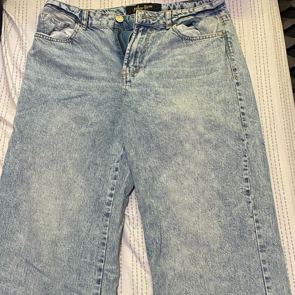 Women’s high waisted, flared light washed jeans